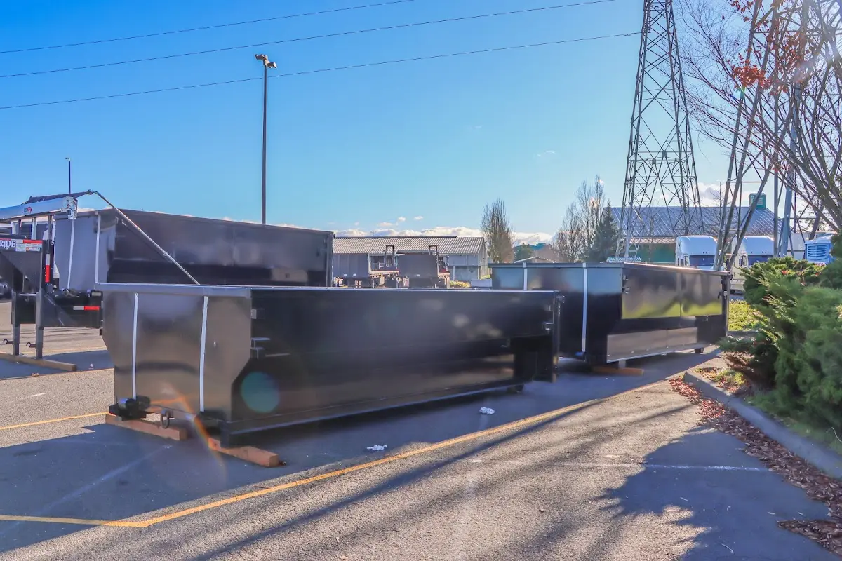 Roll-off dumpster ready for waste disposal at job site for 6 Yard Dumpster Rental in Brunswick